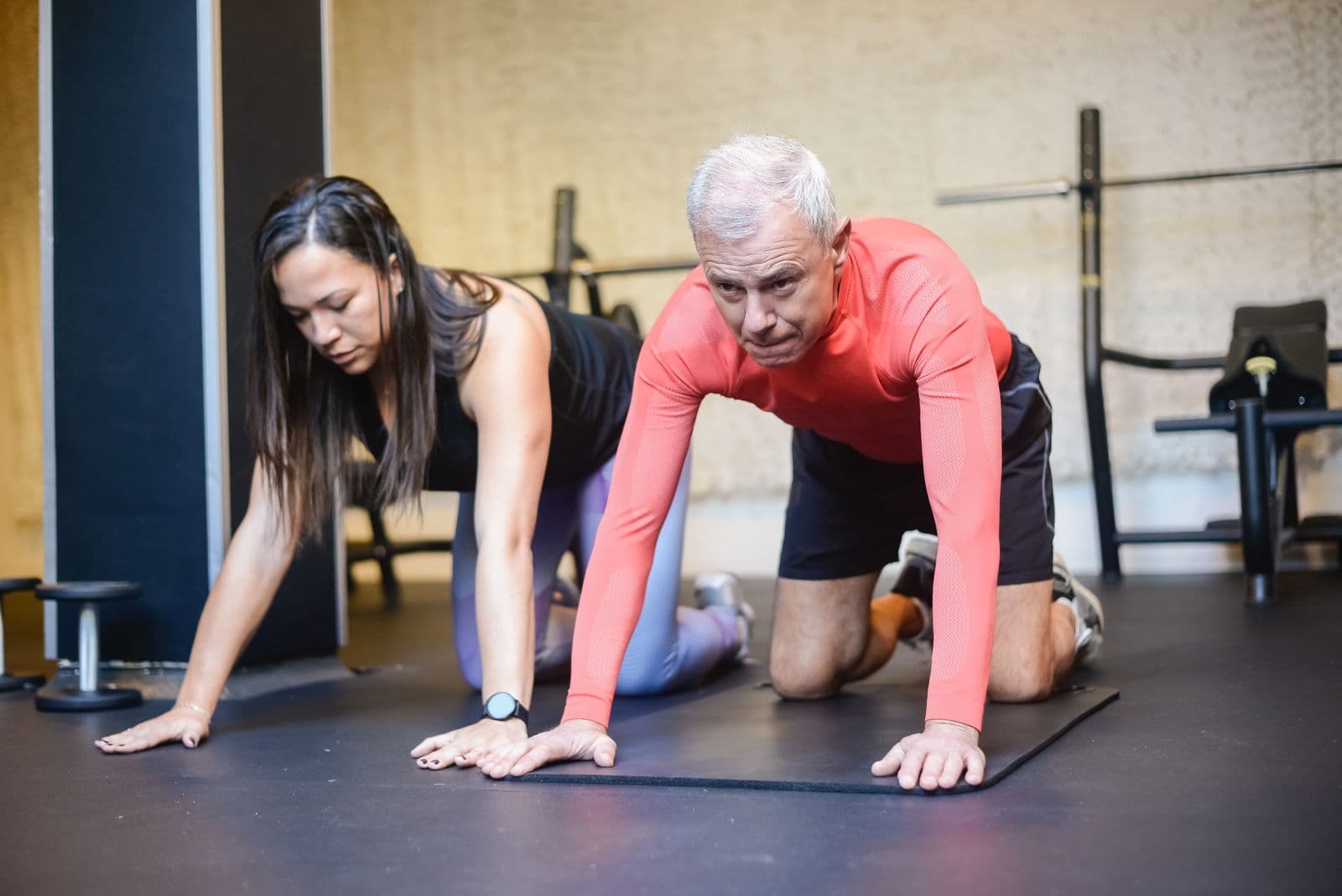 A coach training alongside a client